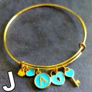 bite & pout "J" Charm Bangle